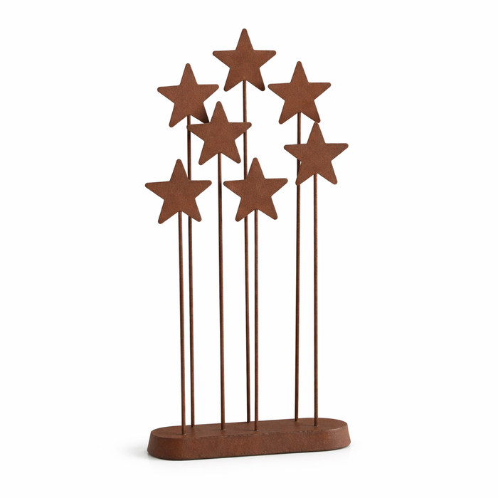 Metal star backdrop for Nativity display with Christmas keepsake styling